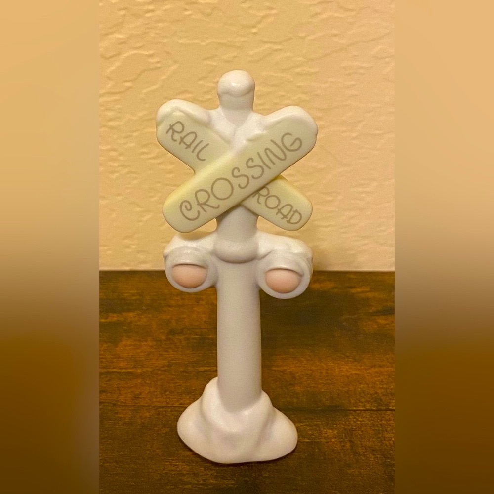 Retired Precious Moments Figurine.